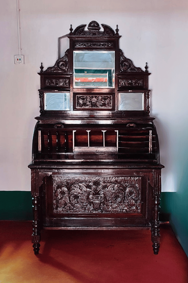 Vintage Wardrobe in a room at Sett Heritage Guest House